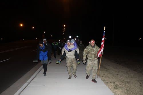 zombie1 Men carrying a segment of the challenge.